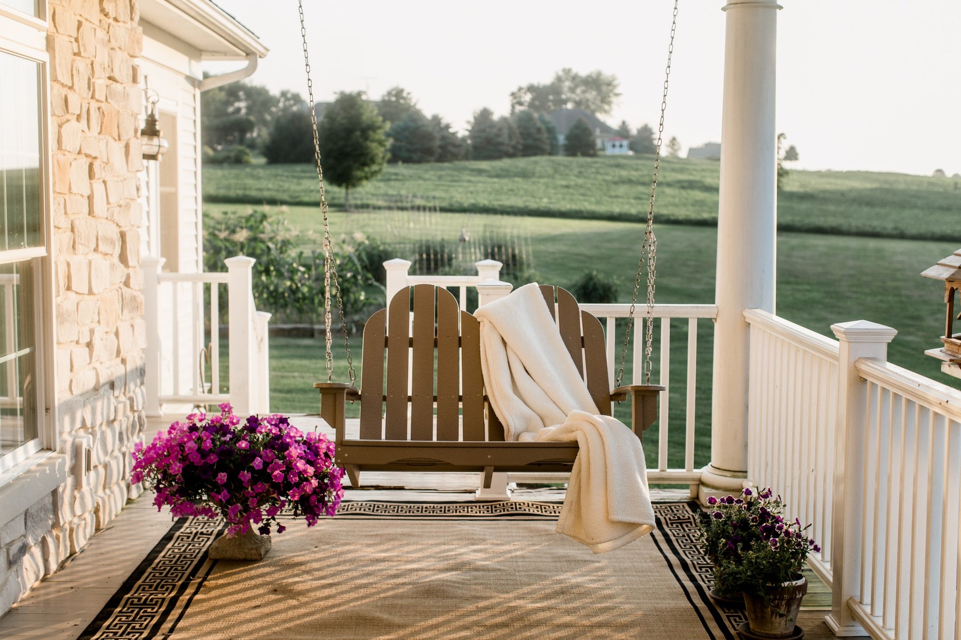 adirondack porch swing with blanket