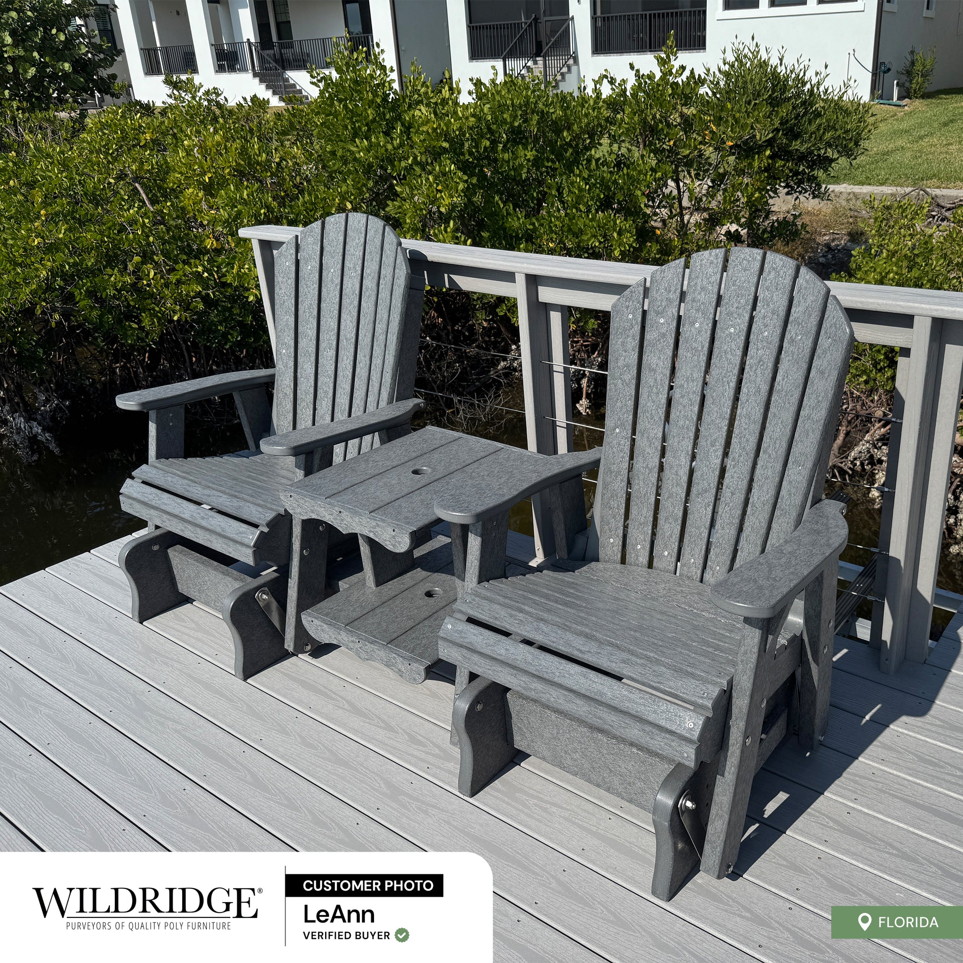 two single adirondack glider chairs with center table dark gray