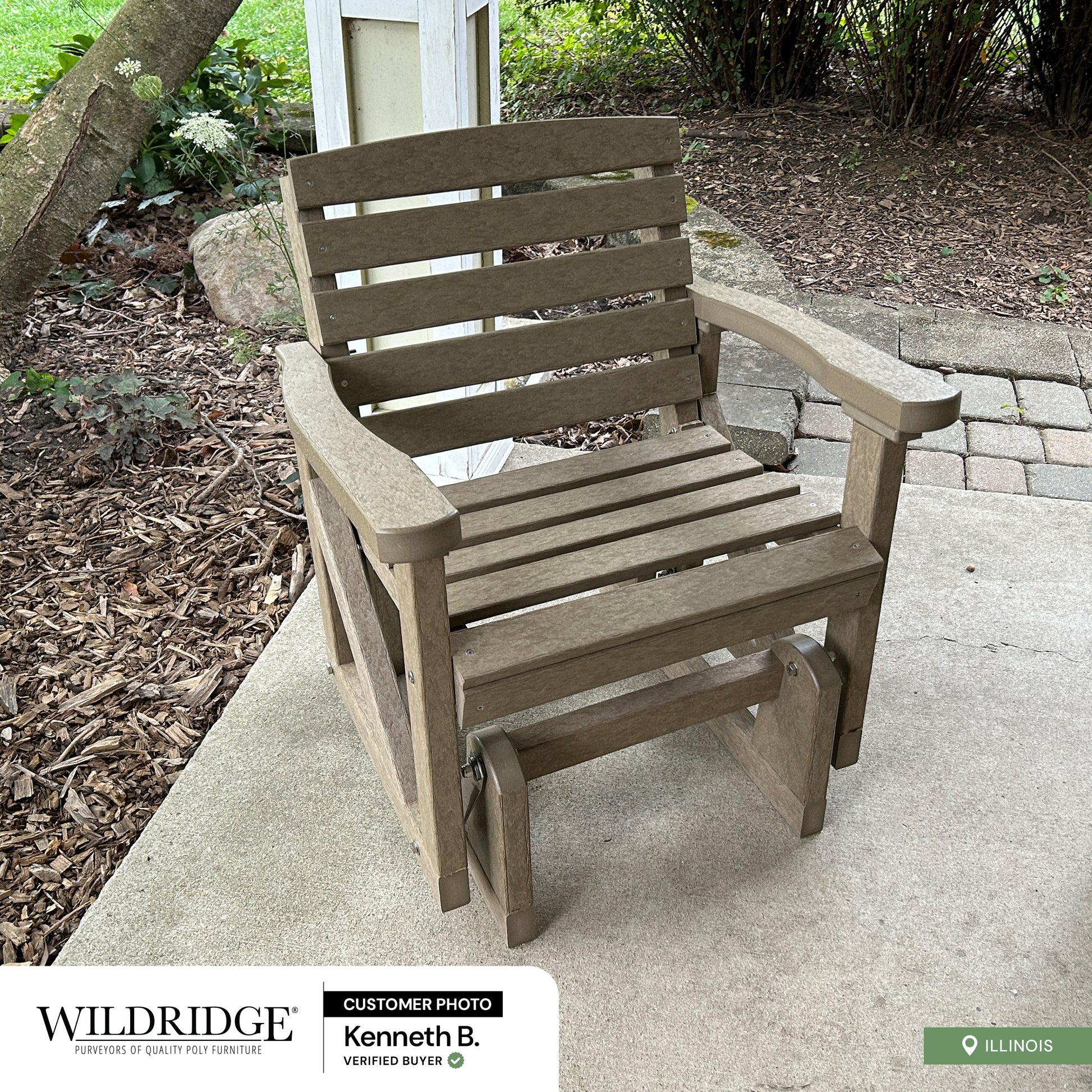 tan single outdoor glider chair