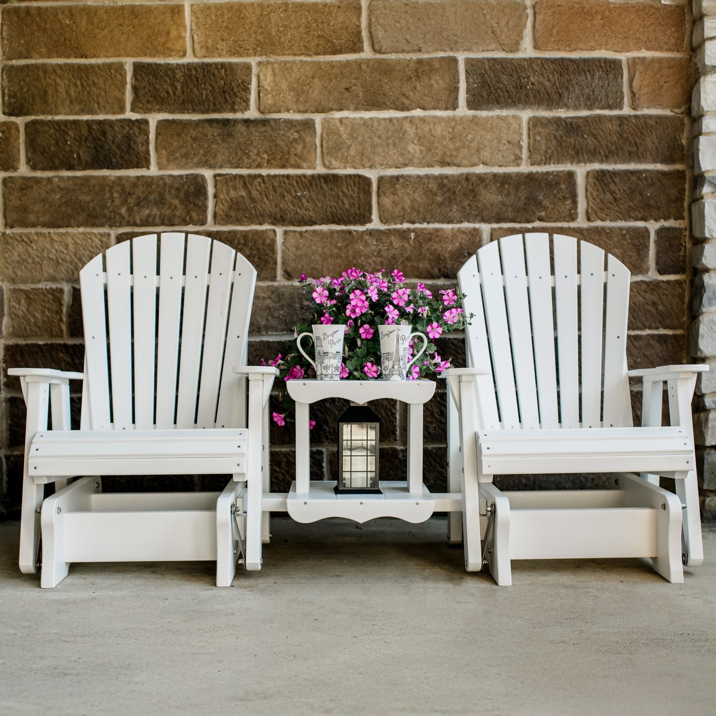 white patio glider set with table