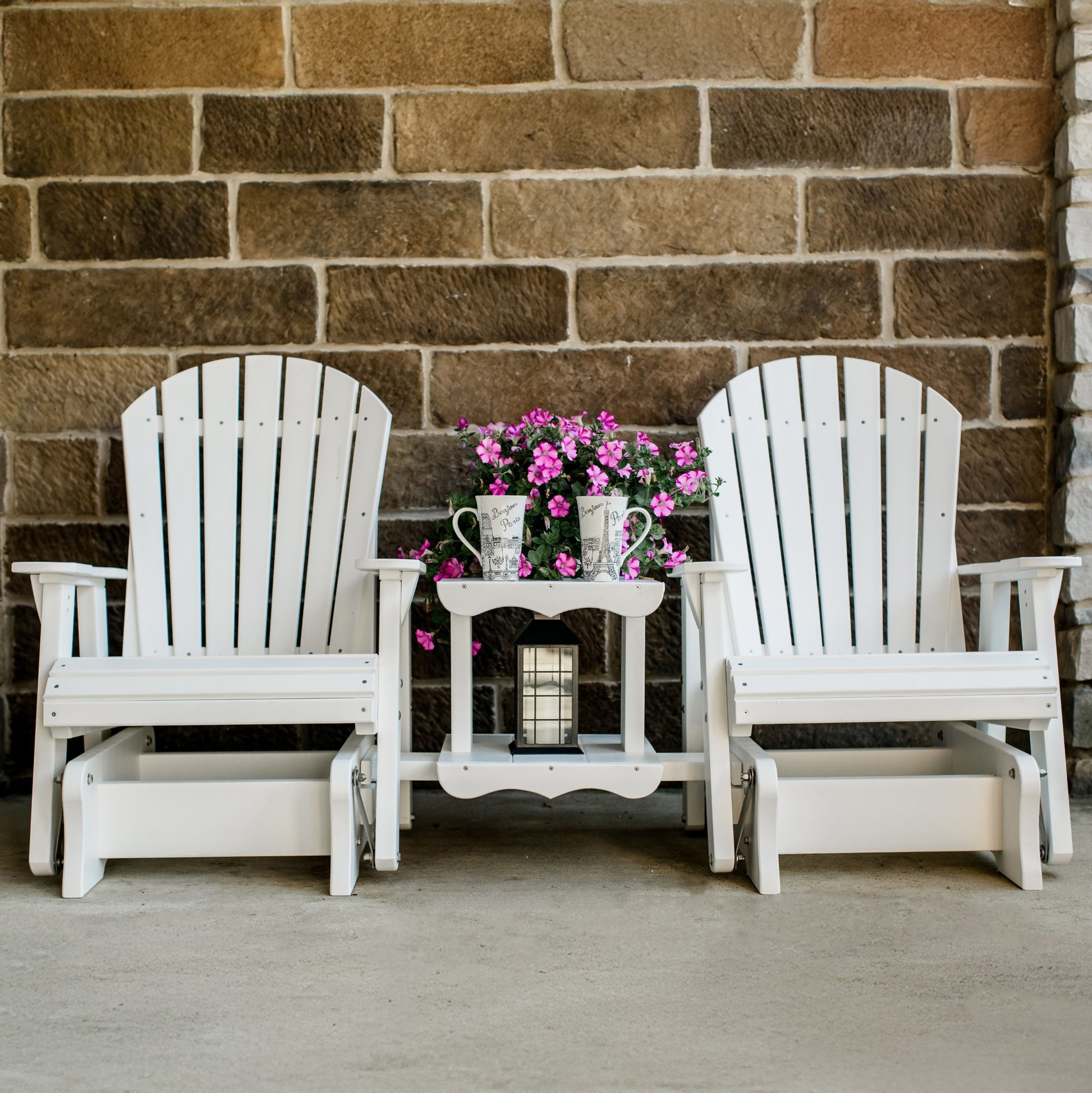 white patio glider set with table