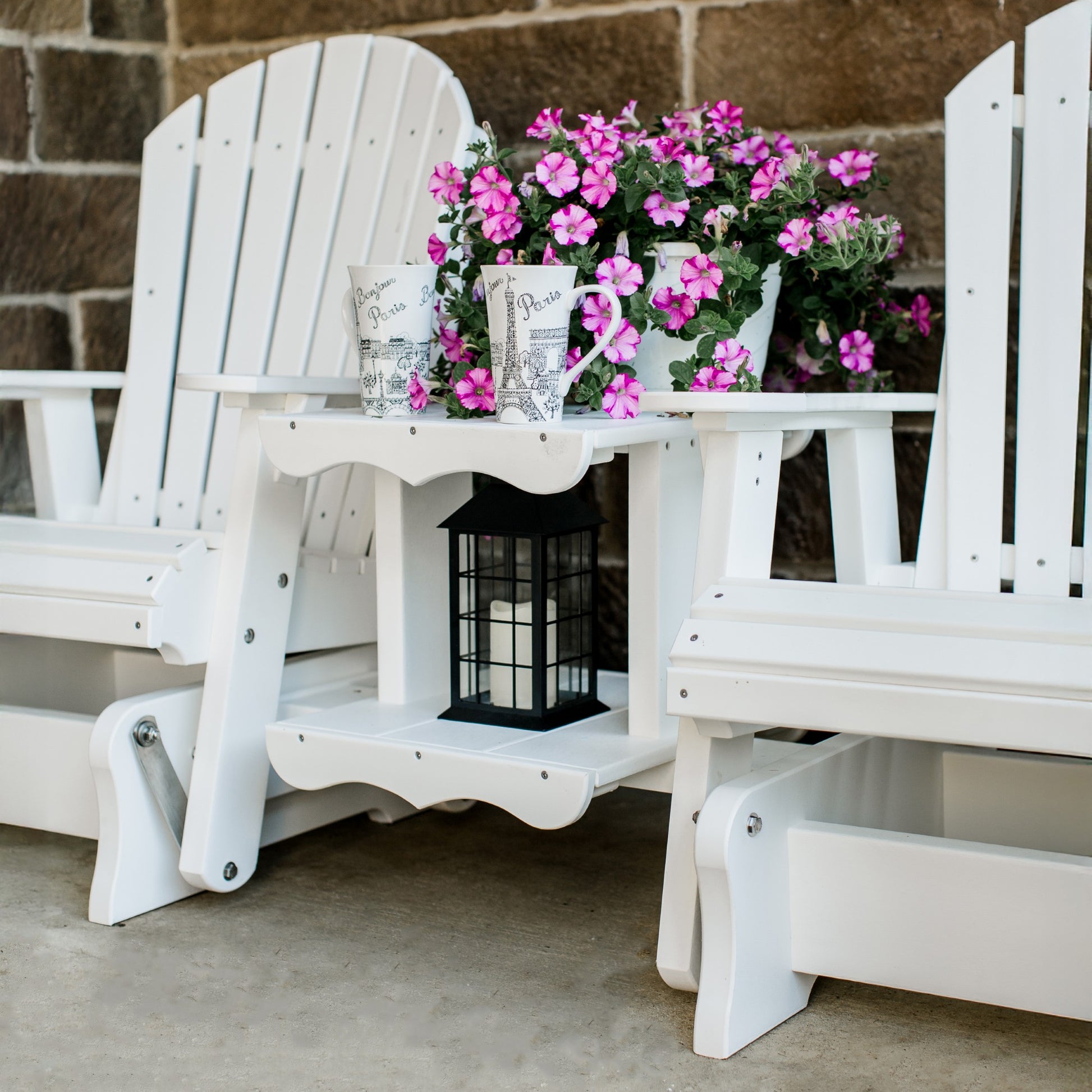 white patio glider set with table