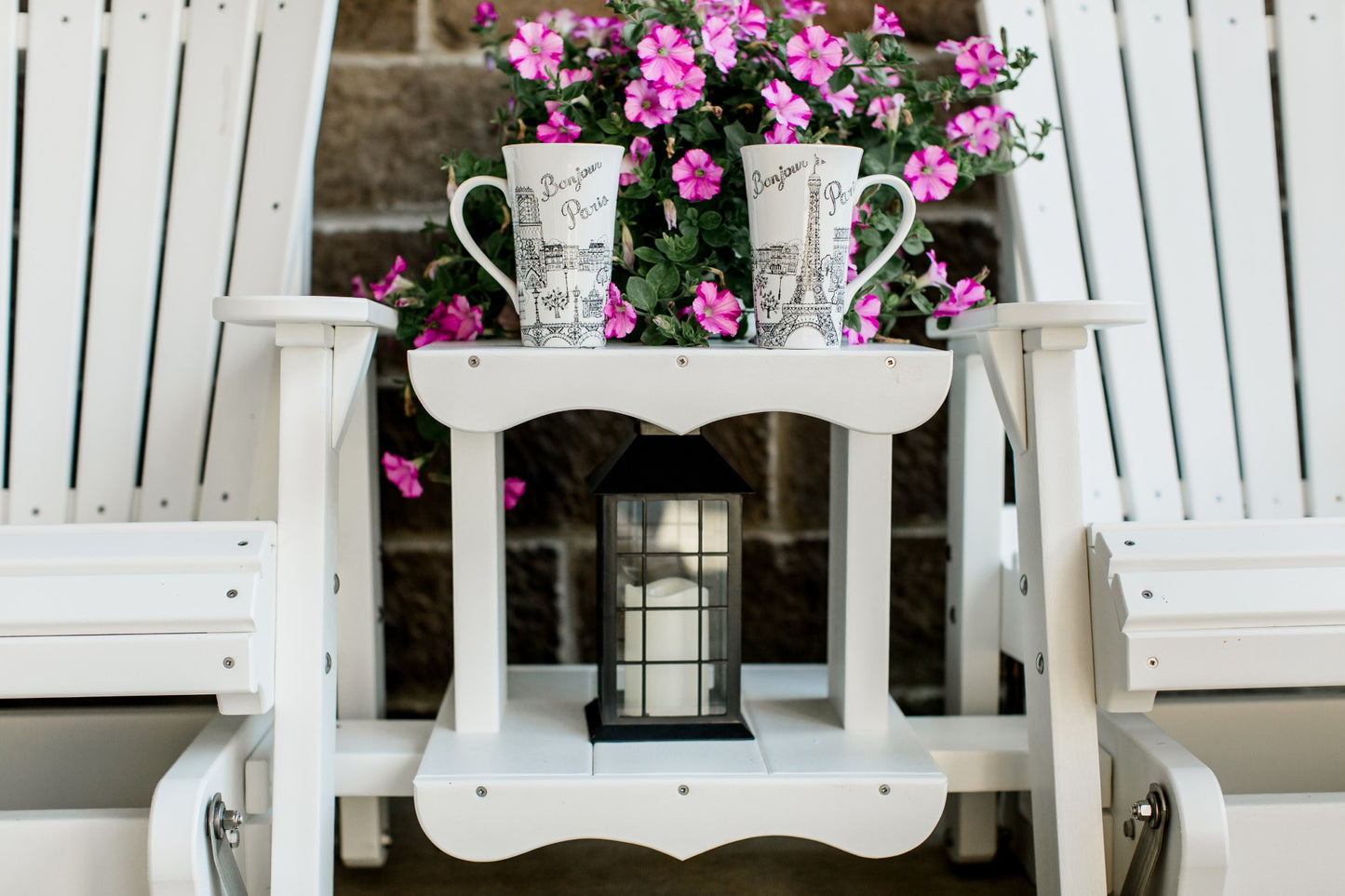 white patio glider set with table
