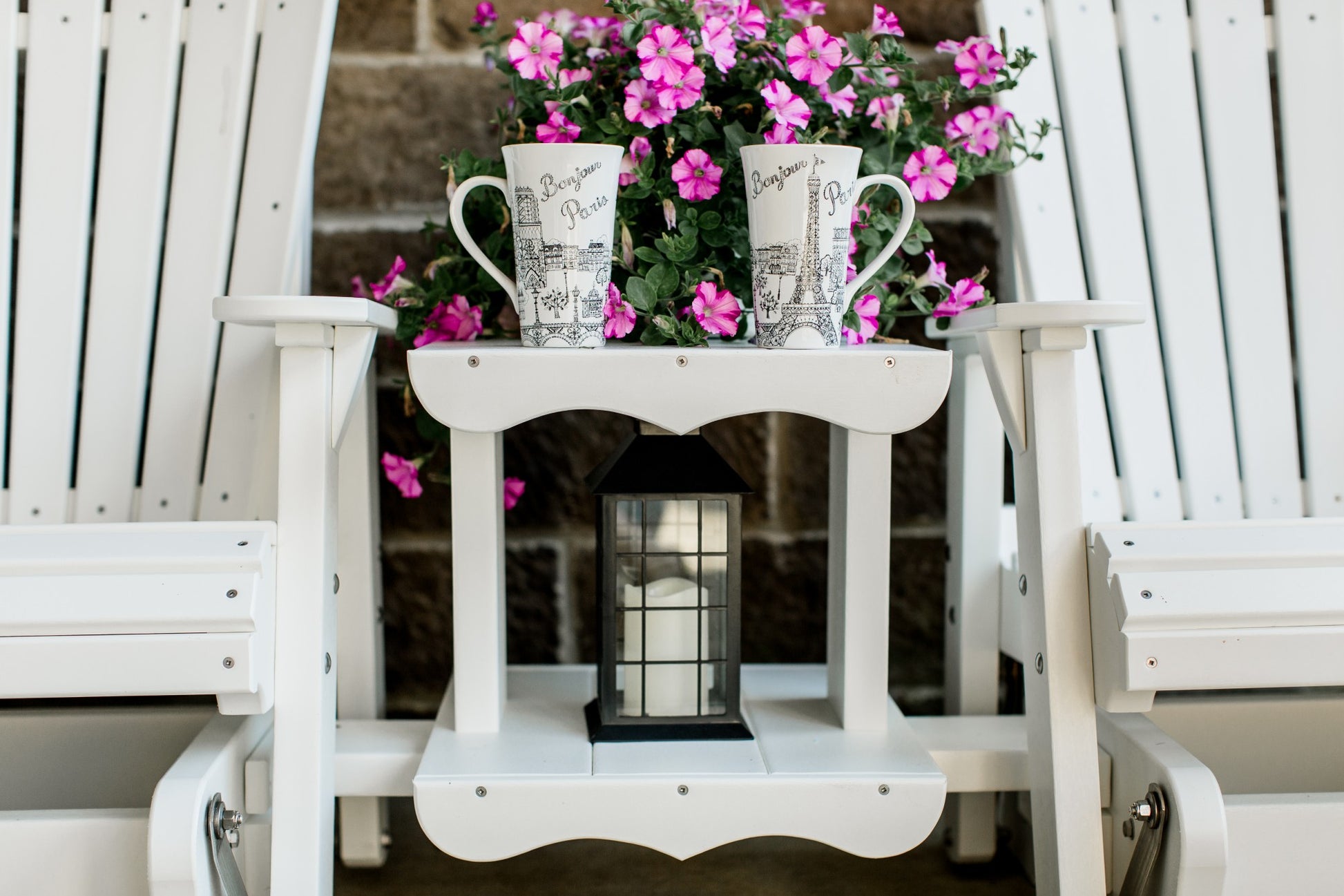 white patio glider set with table