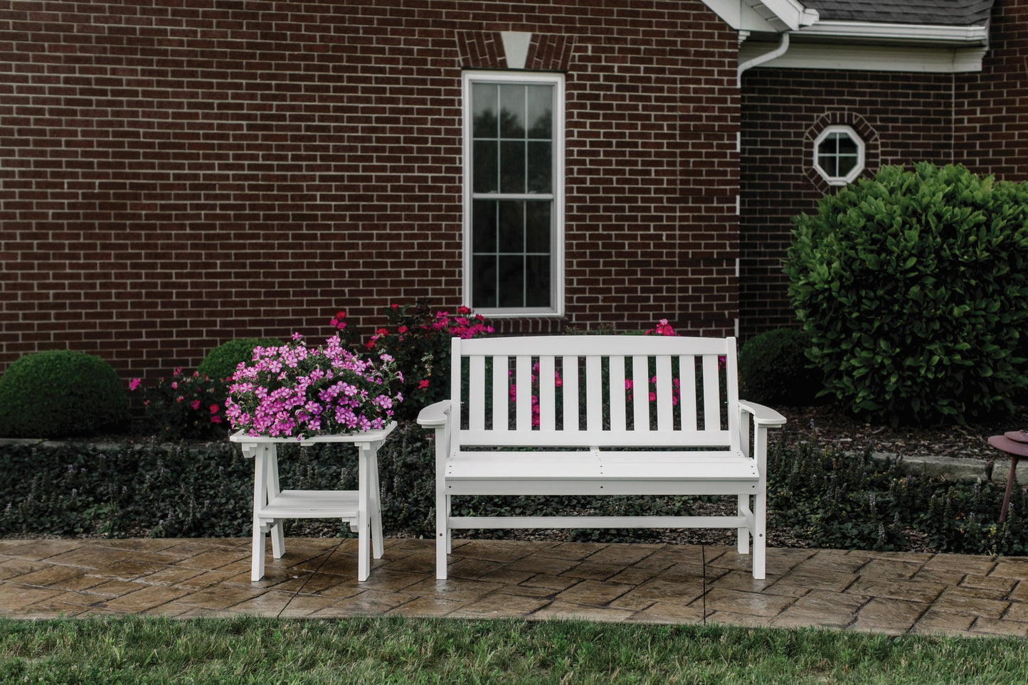 mission bench with side table and flowers