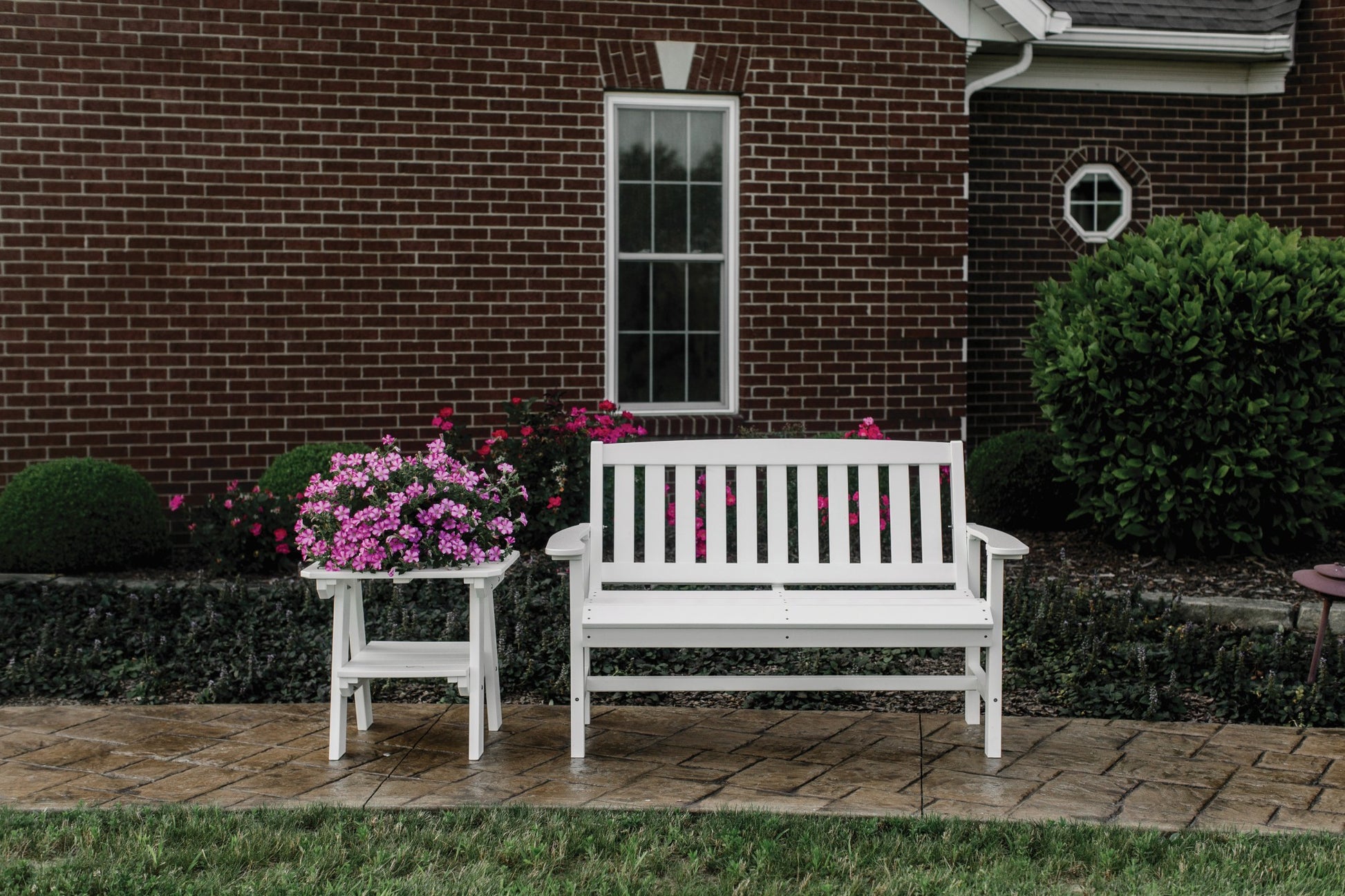 mission bench with side table and flowers