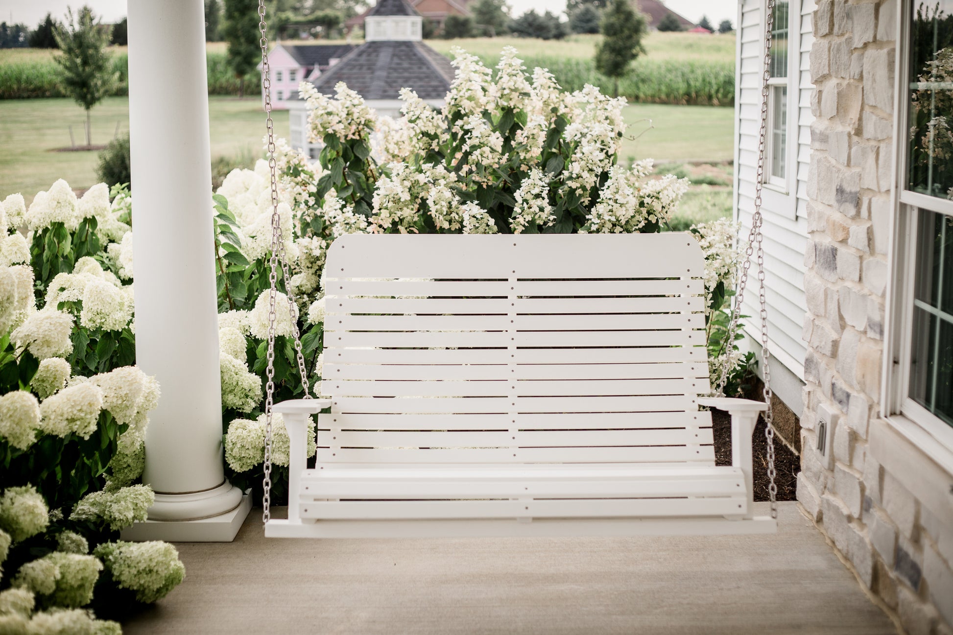 white signature porch swing